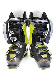 双绿色绿色滑雪鞋追求旅行回旋闲暇黑色带子靴子齿轮衣服白色背景图片