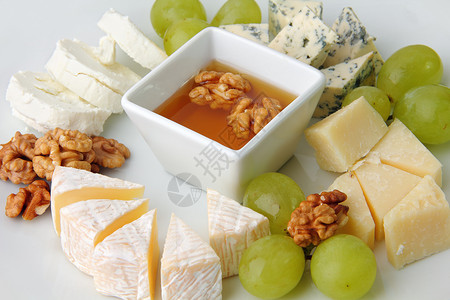 奶酪加葡萄坚果核桃团体熟食食品蜂蜜甜点产品小吃美食高清图片