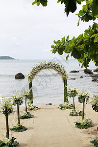 美丽的海滩婚礼设置会场仪式宗教风景婚姻庆典场景展示环境热带宗教的高清图片素材