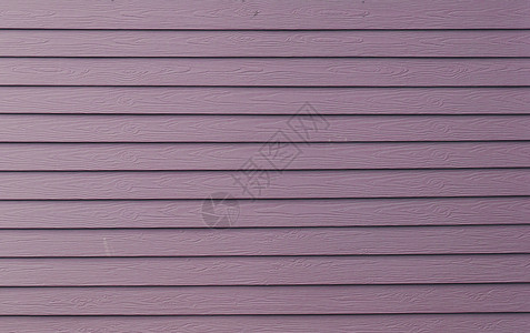 背景紫色涂漆布板壁的纹理背景图片
