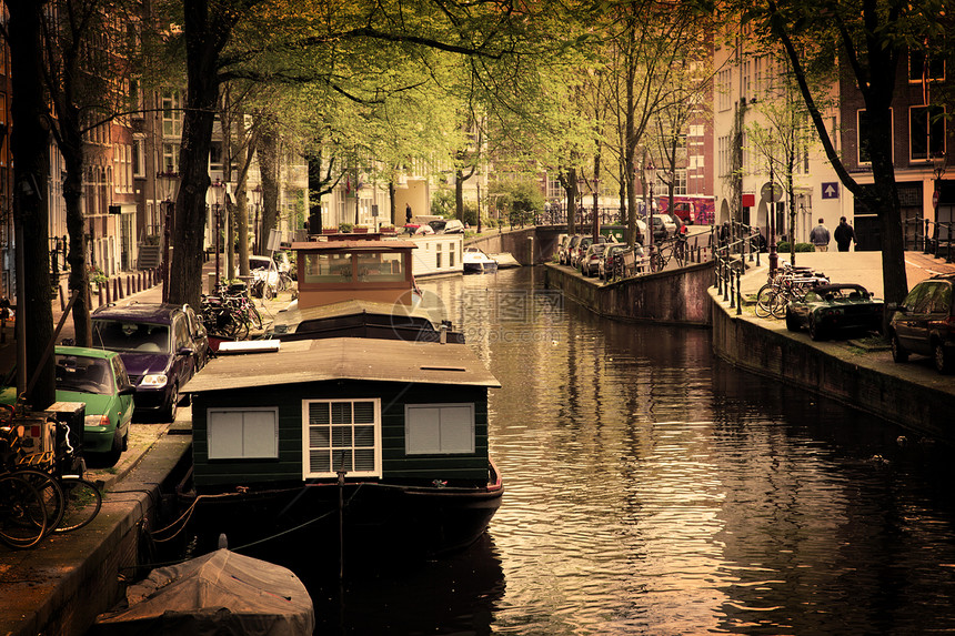 阿姆斯特丹 罗马运河 船金子反射建筑旅行历史性文化建筑学街道运河地标图片