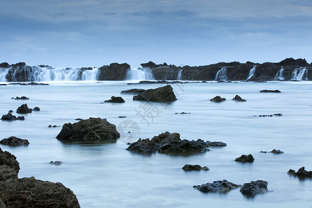 鲨鱼湾海洋岩石天空照片海景休息摄影背景图片