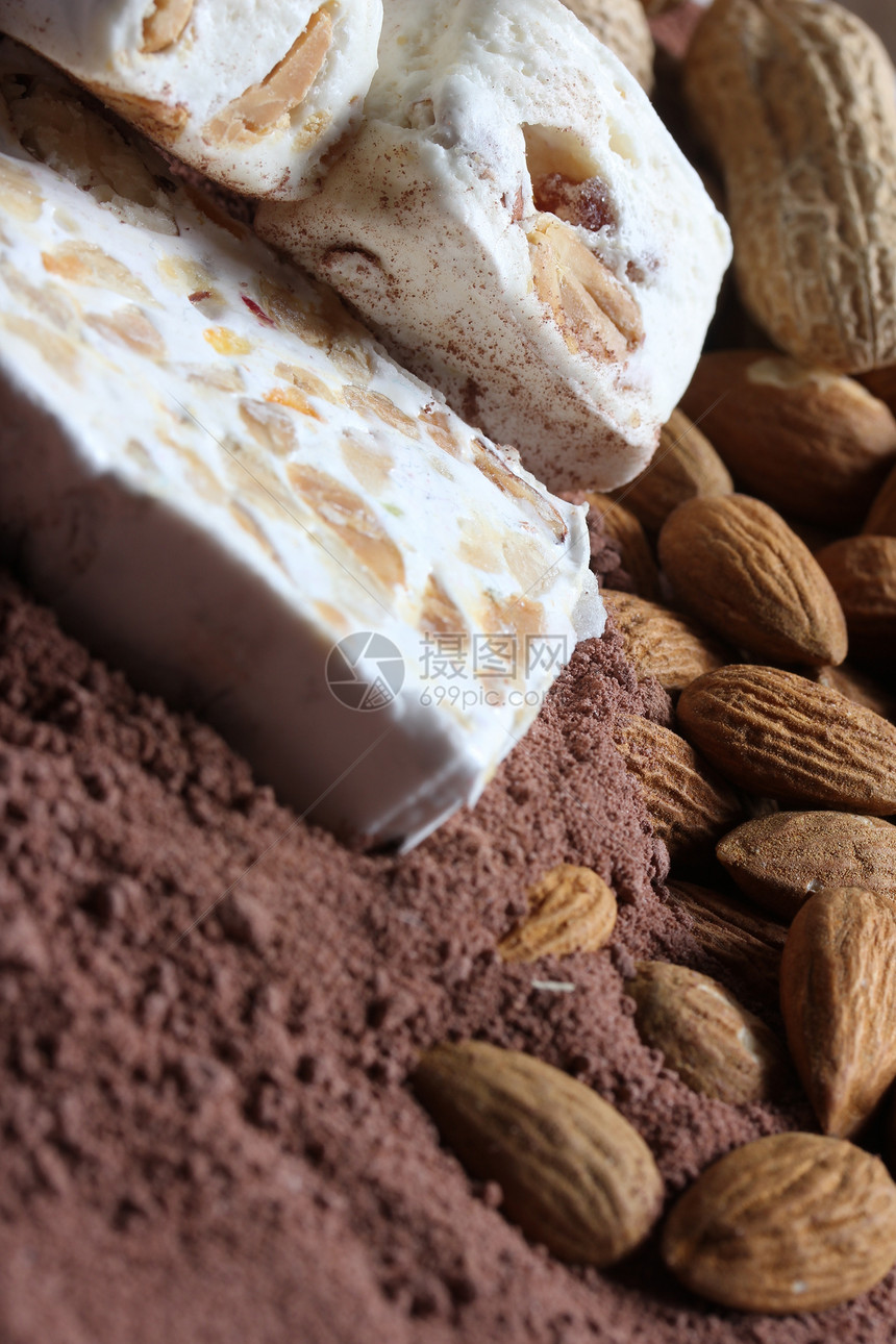 可可中的白诺加糖果白色食物棕色甜点巧克力杏仁花生牛奶图片