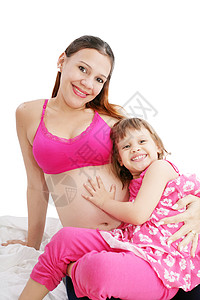 与女儿一起怀着美丽的孕妇手高清图片素材