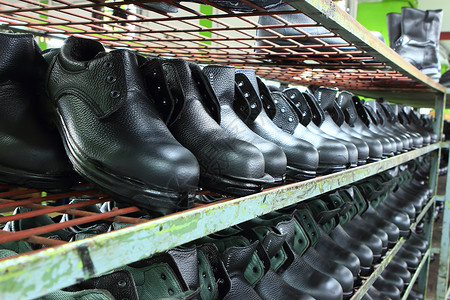 安全鞋厂鞋带工具踏板橡皮服务男人夫妻作坊零售锻炼修理高清图片素材