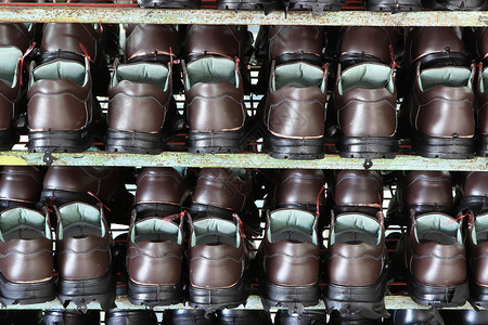安全鞋厂假期夫妻鞋类男人服务旅行橡皮工艺建筑作坊工厂高清图片素材