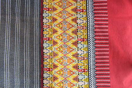 手工编织的泰文风格织布贴近纹理棉布纺织品染料墙纸民间织物传统色调衣服丝绸背景图片