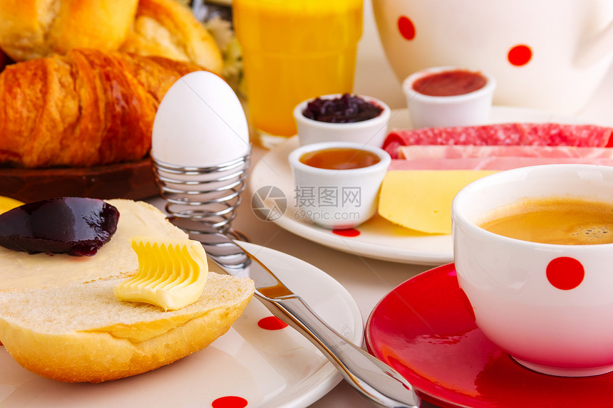 非洲大陆早餐早餐橙汁蜂蜜盘子蛋糕奶油包子棕色咖啡面包黄油图片