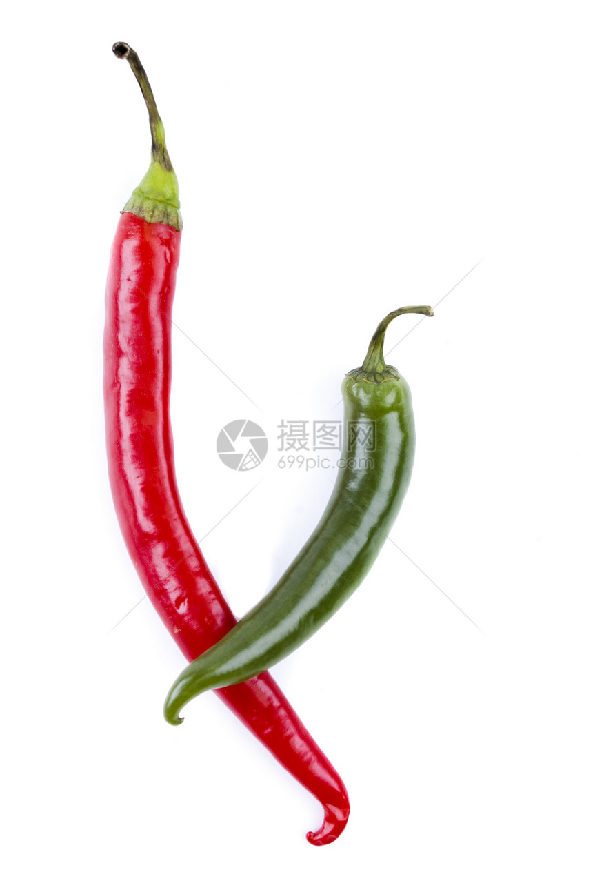 白色背景的红辣椒和绿辣椒绿色夫妻红色食物蔬菜香料图片