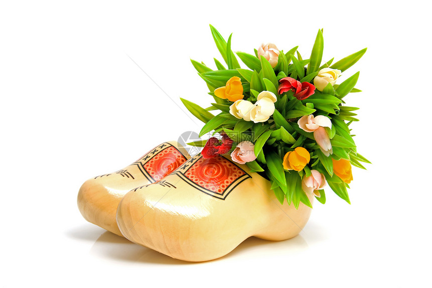 荷兰传统黄色木制鞋一对夫妇农业文化木屐鞋类郁金香花朵衣服戏服纪念品木头图片