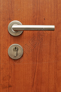门处理器住宅棕色金属锁孔安全入口办公室房间木头钥匙铬合金高清图片素材