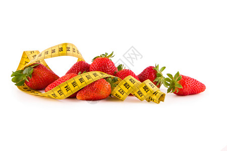 白色的草莓食物营养健康水果植物磁带叶子绿色收成红色背景图片