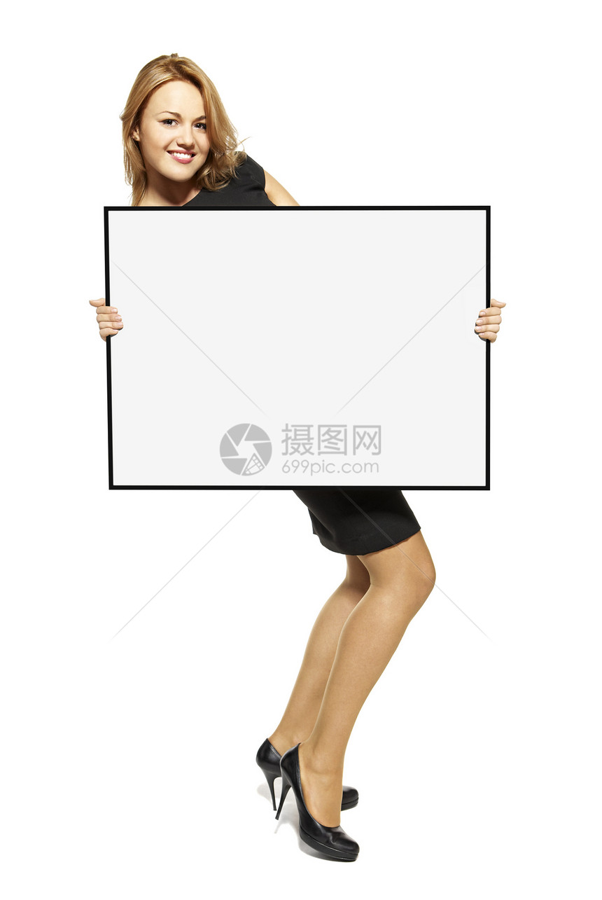 具有吸引力的女性持有海报     孤立裙子高跟鞋标语影棚幸福纸板广告微笑衣冠木板图片
