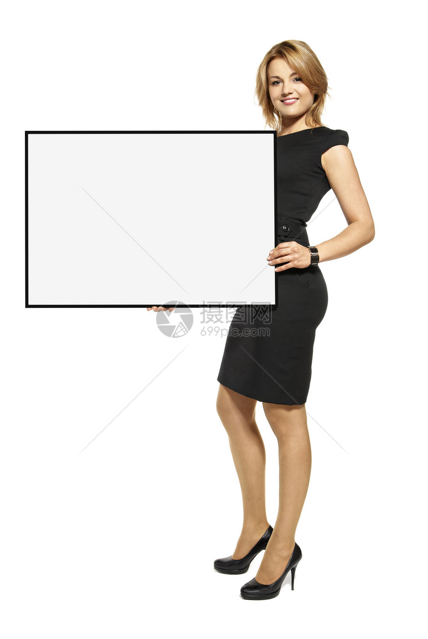 具有吸引力的女性持有海报     孤立影棚标语快乐魅力广告牌幸福黑色衣冠金发靴子图片
