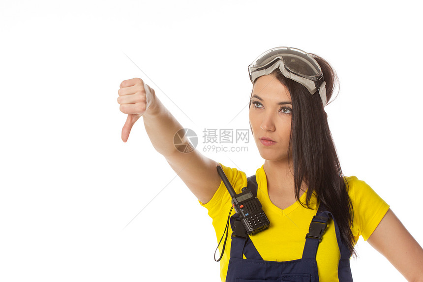 一位女性建筑工人拿着一个信号 与外界隔绝工人帽子女孩职业民众衣服全体公用事业蓝色警告图片