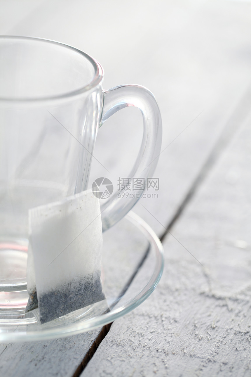 装茶袋的空玻璃杯香气时间玻璃绳索味道杯子饮料茶包文化粉末图片