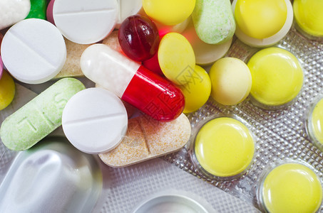 颜色药片和片剂 医疗手段实验室治疗胶囊剂量药物预防颗粒疾病抗生素药理背景图片