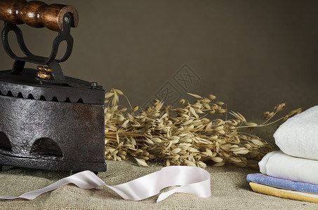 禾谷类作物Retro 铁作物床单纺织品燕麦家用电器磁带帆布丝带物品烙铁背景