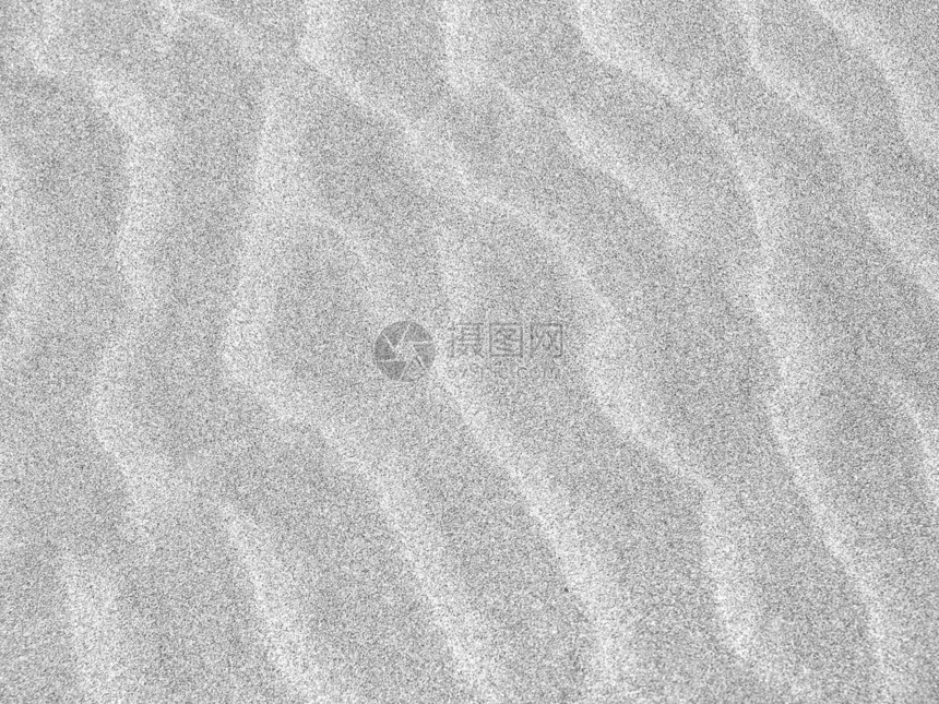 海滩沙波的概要背景背景情况粮食太阳晴天孤独海岸干旱旅行地面棕褐色沙漠图片