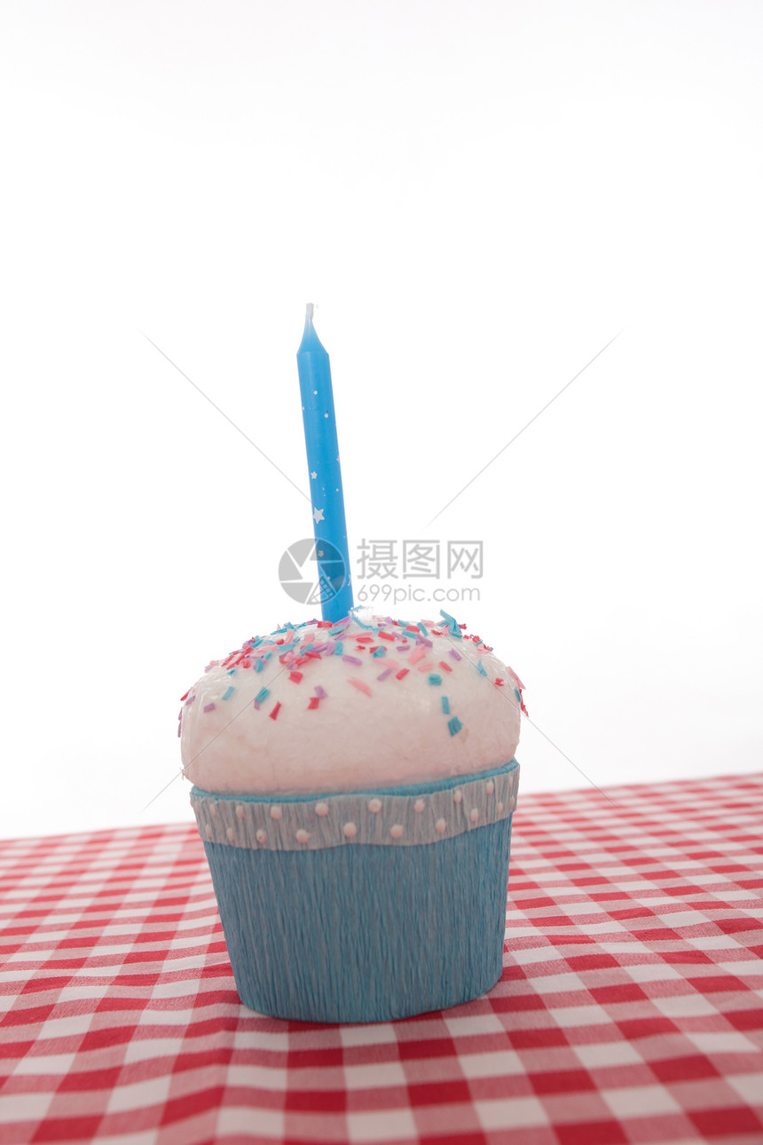 生日纸杯蛋糕巧克力庆典粉色家庭蜡烛卷发食物甜点装饰烘焙图片