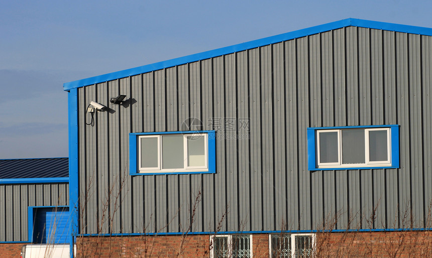 现代工业建设现代工业建筑天空仓库商业蓝色建筑学设施瓦楞安全水平摄像头图片