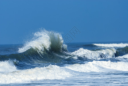 美丽的蓝海浪潮乐趣力量海滩破岸液体冒险天气蓝色冲浪者海洋背景图片