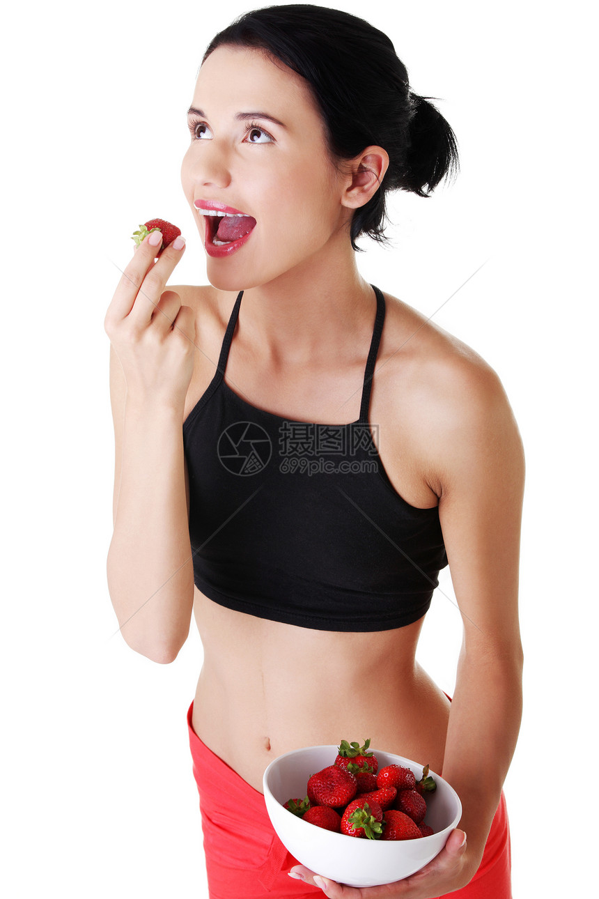 漂亮漂亮的女人吃草莓身体重量女性早餐水果微笑食物成人女孩沙拉图片
