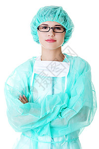 快乐年轻女医生的肖像外科助手帮助专家手套工人手术面具卫生蓝色关心高清图片素材