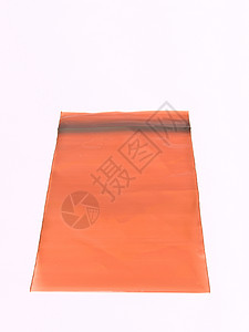 棕色塑料袋 用于在白背地隔离的药品塑料产品零售包装白色药片背景图片