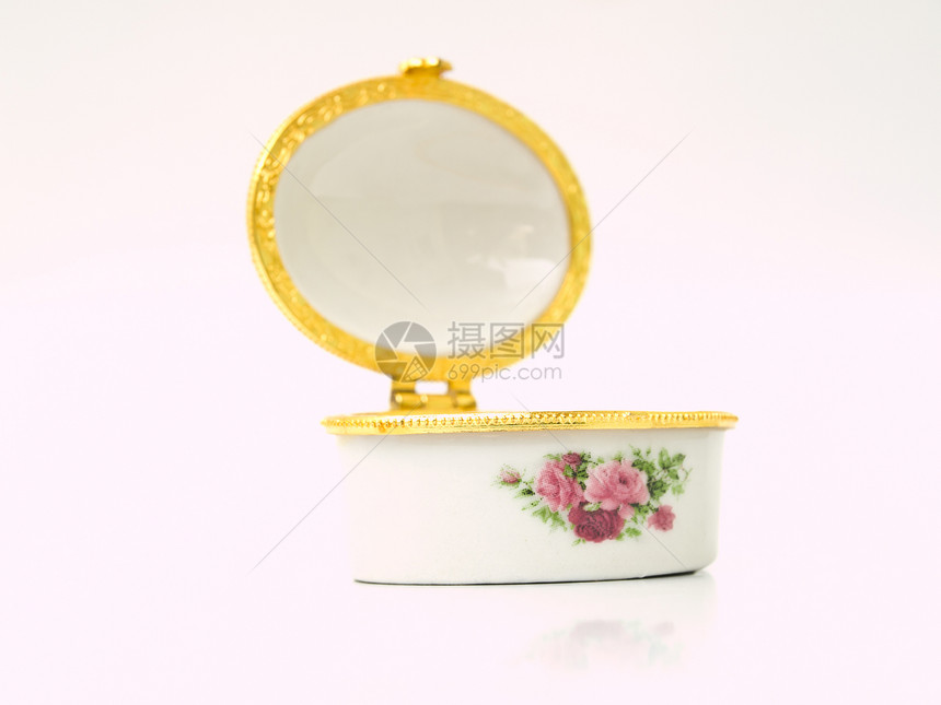 用于为女士保留lozenge或糊贴剂的陶瓷案件宝藏修剪花朵宏观首饰制品珠宝魅力盒子黄色图片