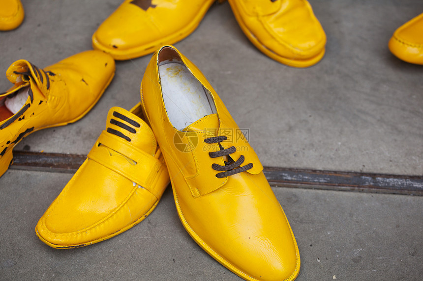 黄雪鞋男人带子皮革运动水平橡皮黄色鞋带蕾丝图片