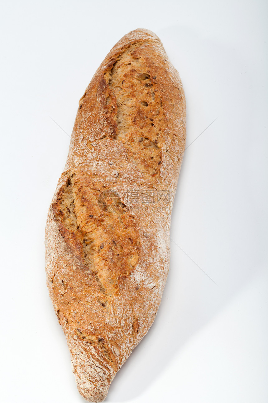 传统烤熟面包的大型小面包早餐粮食饮食食物谷物美食面粉小麦麻布种子图片