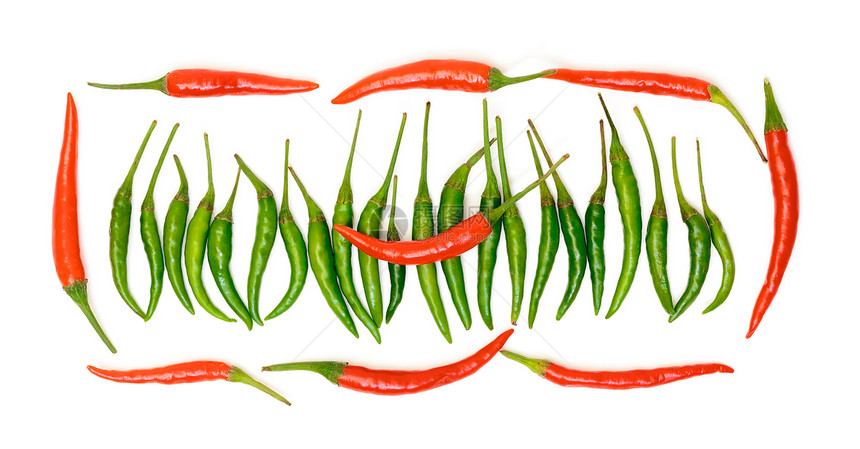 红辣椒和绿辣椒绿色红色烹饪香料蔬菜胡椒食物辣椒素绿色植物白色图片