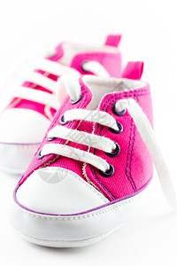 粉红婴儿鞋孩子粉色运动鞋婴儿蕾丝运动鞋类衣服女孩背景图片