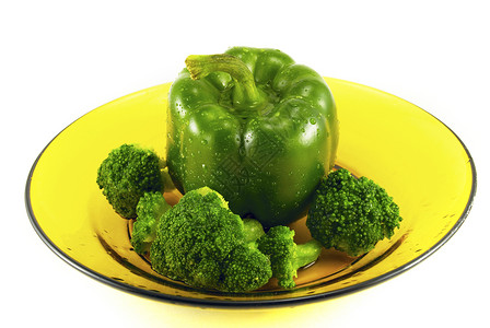 盘子上的胡椒和花椰菜蔬菜美食健康绿色食物活力背景图片