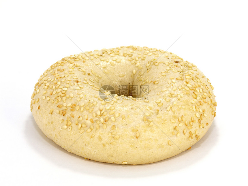 芝麻种子百吉饼圆圈食物圆形早餐小吃面包阴影白色图片