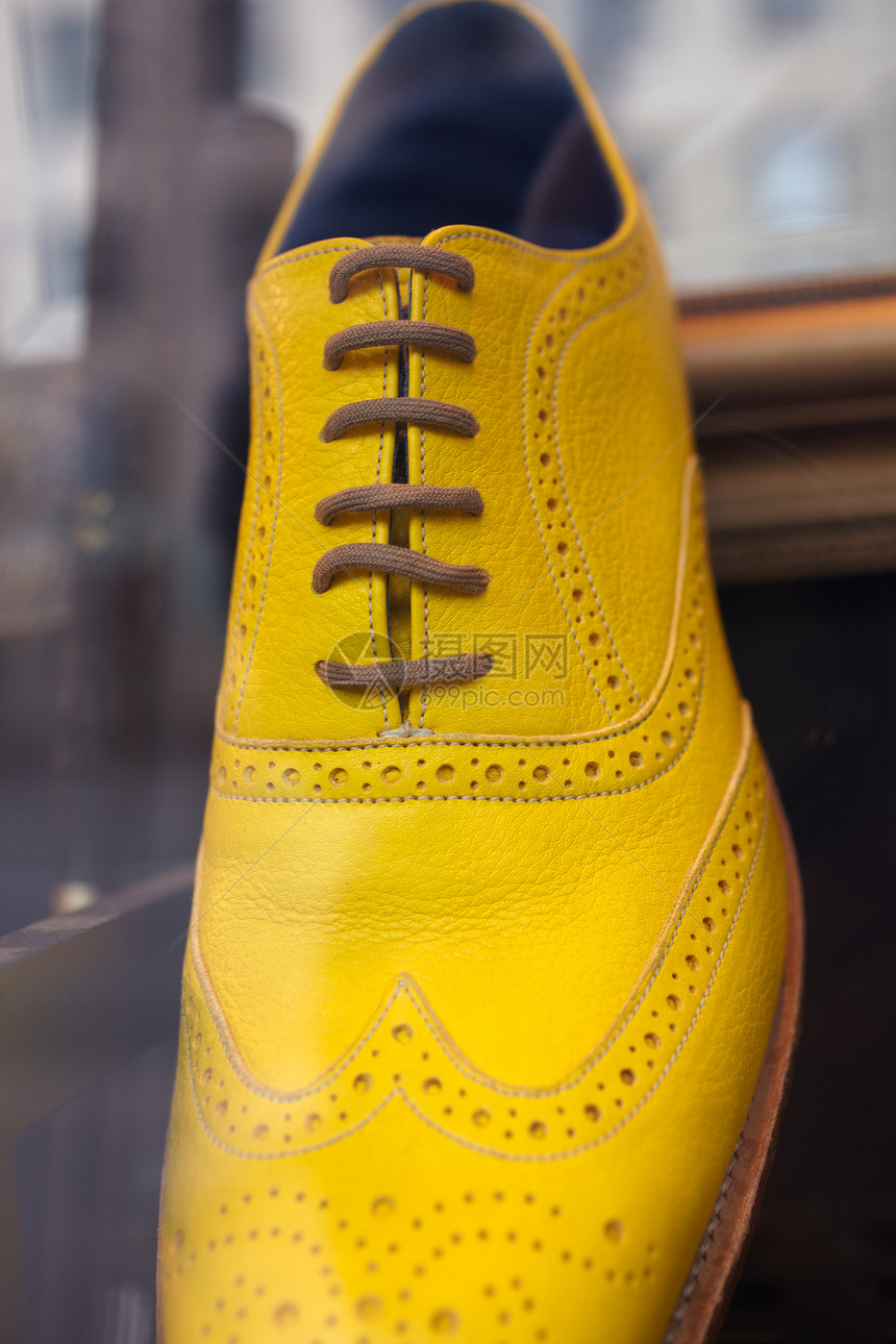 黄雪鞋皮革带子橡皮运动水平男人鞋带蕾丝黄色图片