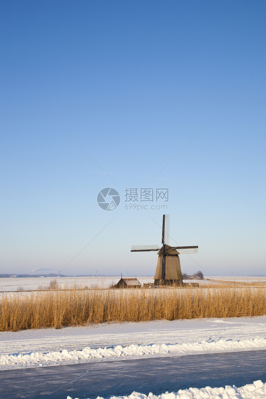 冬季风车 有雪 冰和蓝天空风景建筑学建筑房子农村历史性地标天空刀刃图片