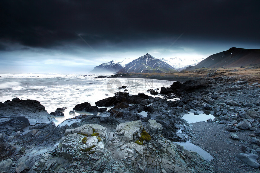 东南冰原的暴风海天空危险海岸山脉力量旅行岩石环境火山地平线图片