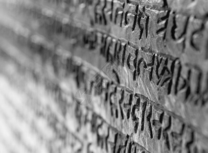 斋沙默尔沙石墙上的印地安象形文字皇家砂岩历史性艺术语言文档历史雕刻建筑学石头背景