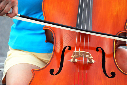女大提琴手女士讲师音乐家演员字符串乐器老师成人女性音乐背景图片