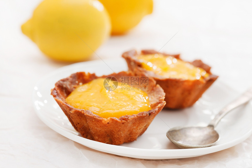 柠檬塔白色勺子水果食物早餐黄色营养糕点小吃柠檬图片
