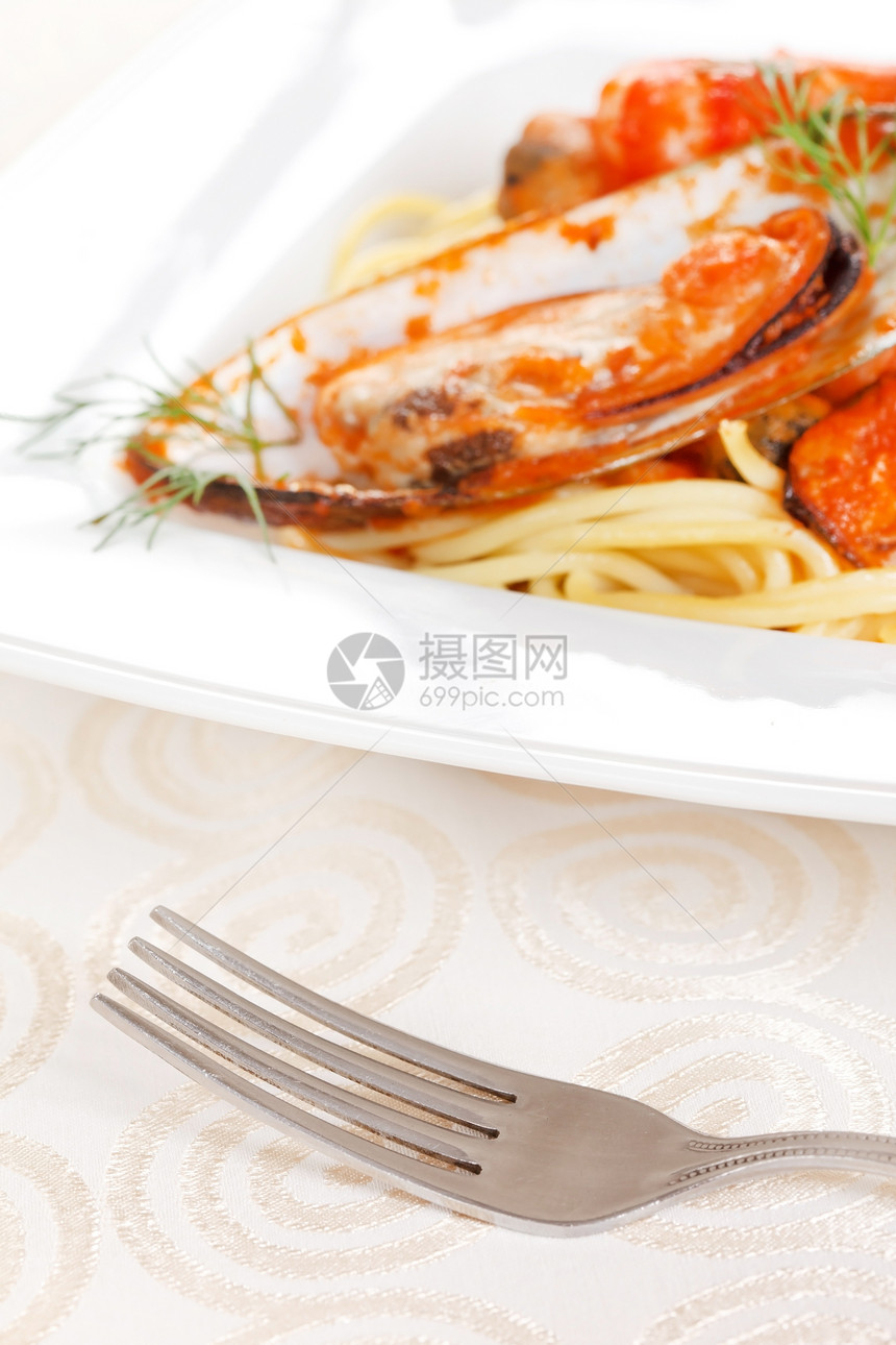 含贝贝贝类的意大利面午餐养分美食盘子饮食鱿鱼营养面条海鲜食物图片