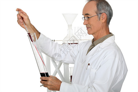 实验室经验产品男人职业眼镜化学工作灰色化学成分学习头发背景图片