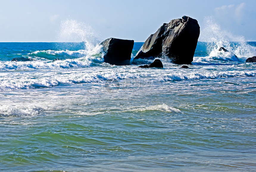 海浪珊瑚礁背景图图像岩石旅游风景晴天季节波浪海洋冲浪假期热带图片