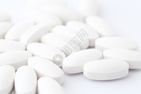 白平板医疗药片药品治疗治愈药物团体白色圆形制药背景图片