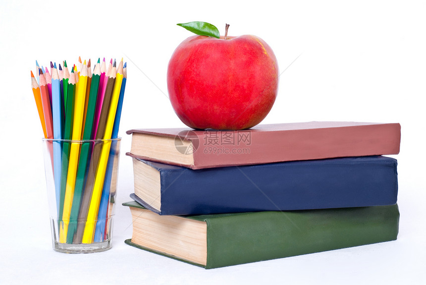 书塔 苹果在白色上被隔绝图书馆桌子脊柱书店学习文学全书手册学校百科图片