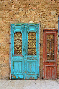 两扇门房子住宅圣地金属遗产网格石头旅行雅法路面高清图片