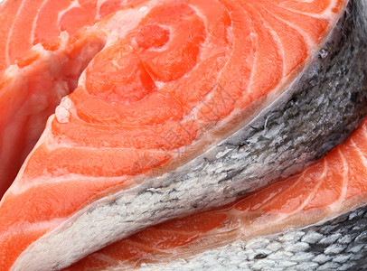 新鲜鲑鱼的生肉片产品鳟鱼红色海鲜食物牛扒背景图片