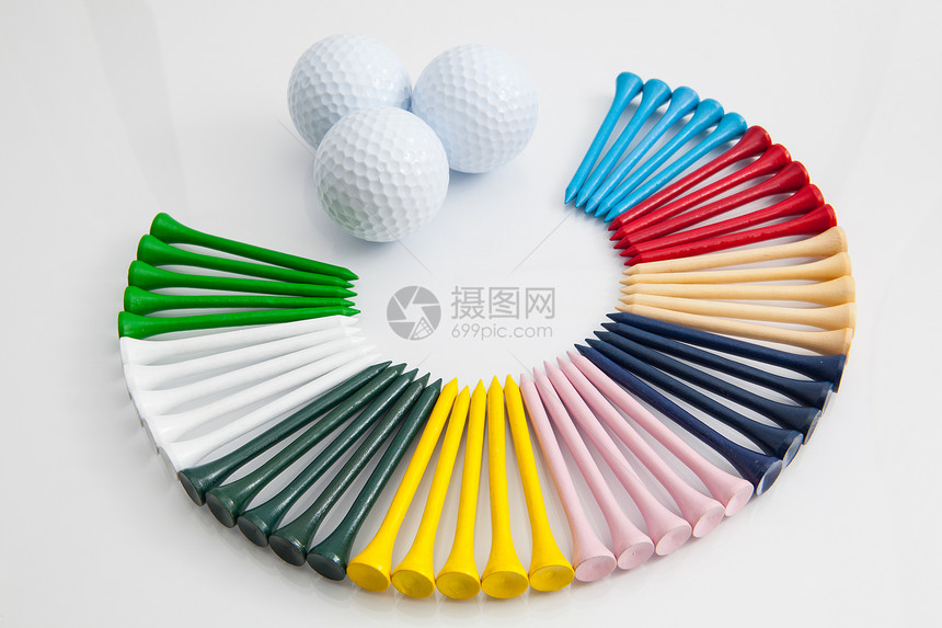 色彩多彩的木制高尔夫球材料发球台静物圆圈木头运动戒指图片